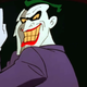 The Joker points his index finger up, giving the most disturbing grin while turning his back. Creepy.